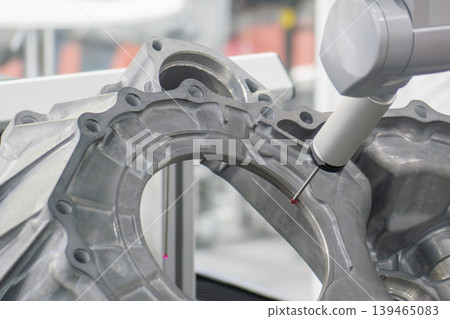 High-precision multi-axis CMM machine measuring aluminum gear parts from the die casting process. 139465083
