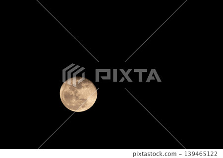 Close-up of the moon floating in the early spring night sky 26 Close-up of the moon floating in the early spring night sky 26 139465122