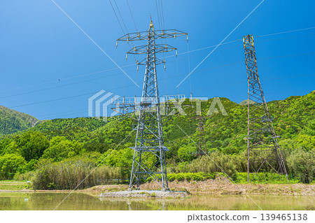 A transmission tower standing in the foothills of the Kosei region, Hira, Otsu City, Shiga Prefecture A transmission tower standing in the foothills of the Kosei region, Hira, Otsu City, Shiga Prefecture 139465138