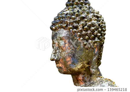 Buddha statue head metal sculpture gold texture spiritual art meditation calm figure isolated background serene mood Buddha statue head metal sculpture gold texture spiritual art meditation calm figure isolated background serene mood 139465218