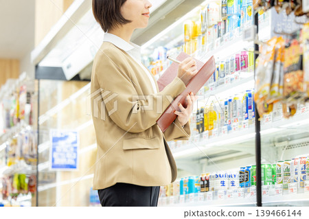 Head office staff inspecting the supermarket Head office staff inspecting the supermarket 139466144
