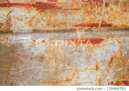 Rough metal surface covered in rust with organic abstract patterns. Works for design textures, artistic backgrounds, and industrial styling. 139466763