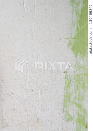 Close-up of wall plaster being smoothed during repair preparation. Suitable for renovation themes, building materials, and interior maintenance visuals. Close-up of wall plaster being smoothed during repair preparation. Suitable for renovation themes, building materials, and interior maintenance visuals. 139466842