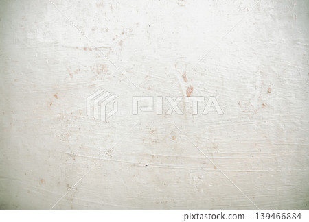 Rough plaster texture on wall during repair stage in interior space. Works for home improvement themes, construction backgrounds, and material detail shots. Rough plaster texture on wall during repair stage in interior space. Works for home improvement themes, construction backgrounds, and material detail shots. 139466884