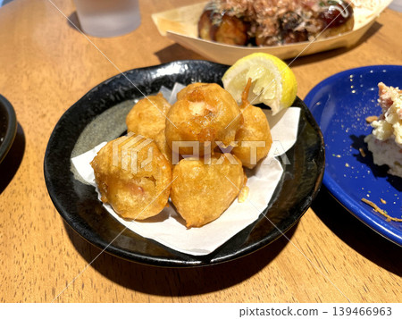 Deep-fried octopus with lemon Deep-fried octopus with lemon 139466963