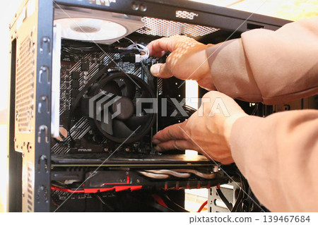 A scene from the process of assembling a custom-built PC. 139467684