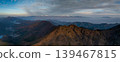 The ridgeline of the Southern Alps bathed in the morning sun. 139467815