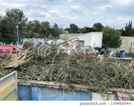 a container full of garden waste at a recycling facility a container full of garden waste at a recycling facility 139468044