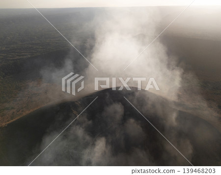 Steam smoke come out from volcano crater Steam smoke come out from volcano crater 139468203