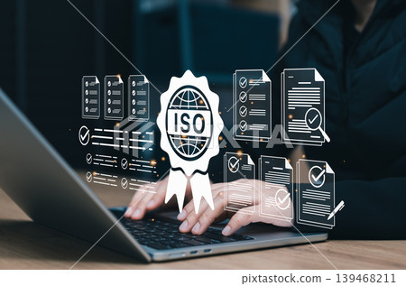 ISO certification compliance and quality audit concept. professional using laptop with virtual approved documents, checklists, verification badge, policy review, standard control, business assurance ISO certification compliance and quality audit concept. professional using laptop with virtual approved documents, checklists, verification badge, policy review, standard control, business assurance 139468211