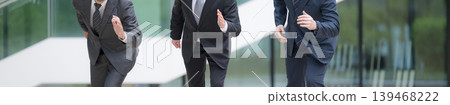 A portrait of a sales team in suits, starting off with a bang, representing their challenge and growth image. (Banner without faces) A portrait of a sales team in suits, starting off with a bang, representing their challenge and growth image. (Banner without faces) 139468222