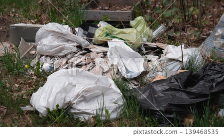 Forestedge Illegal Dump Of Mixed Waste, Assorted Bags And Packaging Strewn At Tree Line, Visual Evidence Of Flytipping And Environmental Neglect, Urgent Remediation And Reporting Recommended Forestedge Illegal Dump Of Mixed Waste, Assorted Bags And Packaging Strewn At Tree Line, Visual Evidence Of Flytipping And Environmental Neglect, Urgent Remediation And Reporting Recommended 139468535