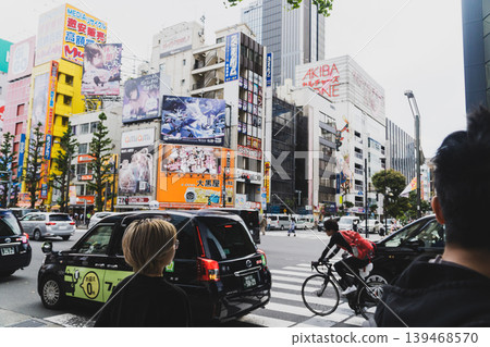 A cityscape of Tokyo: Akihabara on a certain day, lonely people. A cityscape of Tokyo: Akihabara on a certain day, lonely people. 139468570