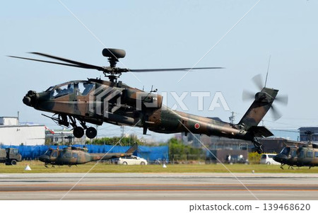 An AH-64D Apache Longbow takes off. An AH-64D Apache Longbow takes off. 139468620