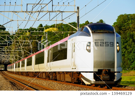 The Narita Express running on the Sobu Main Line in the evening. The Narita Express running on the Sobu Main Line in the evening. 139469129