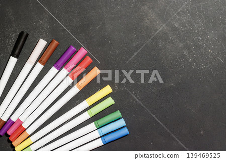 Colorful markers on a dark background. Art and Education Concept. Blank Space. Colorful Markers. High quality photo Colorful markers on a dark background. Art and Education Concept. Blank Space. Colorful Markers. High quality photo 139469525
