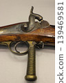 trigger of an old flintlock gun  139469581