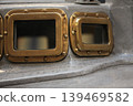 old brass portholes 139469582
