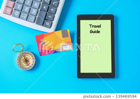 Booking for travel online by tablet and credit card. Booking for travel online by tablet and credit card. 139469594