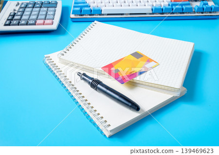 Credit card on notebook and pen,E- business. Credit card on notebook and pen,E- business. 139469623