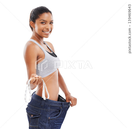 Happy woman, portrait and measuring tape in weight loss or diet against a white studio background. Slim young female person or model smile for pants size, waist or health and wellness on mockup space 139469643