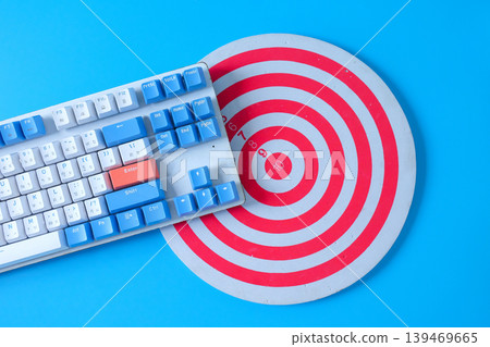 Computer keyboard on drat board game. Computer keyboard on drat board game. 139469665