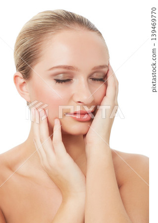 Woman, makeup and beauty with eyes closed, face and hands for skin, cosmetics on white background. Topless, beautiful and headshot with shine, skincare or clean for glow, cosmetology and grooming Woman, makeup and beauty with eyes closed, face and hands for skin, cosmetics on white background. Topless, beautiful and headshot with shine, skincare or clean for glow, cosmetology and grooming 139469770