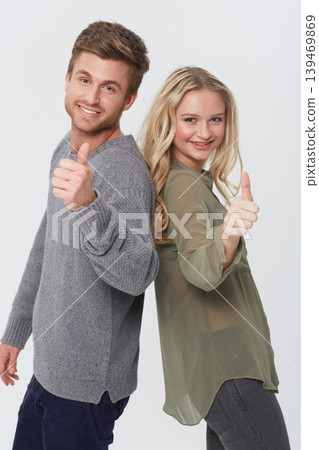 Portrait, smile and couple with thumbs up for success, choice or agreement together. Happy man, woman and like hand sign, gesture or emoji in love recommendation isolated on a white studio background Portrait, smile and couple with thumbs up for success, choice or agreement together. Happy man, woman and like hand sign, gesture or emoji in love recommendation isolated on a white studio background 139469869
