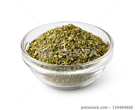 Dried oregano in glass bowl for seasoning and cooking Dried oregano in glass bowl for seasoning and cooking 139469888