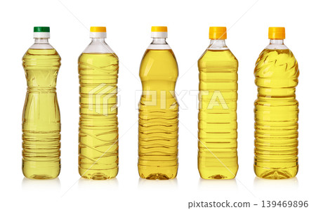 Cooking oil assortment in plastic bottles on white background Cooking oil assortment in plastic bottles on white background 139469896