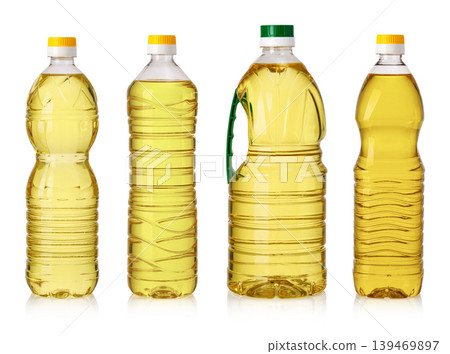 Four plastic bottles containing various cooking oils isolated Four plastic bottles containing various cooking oils isolated 139469897