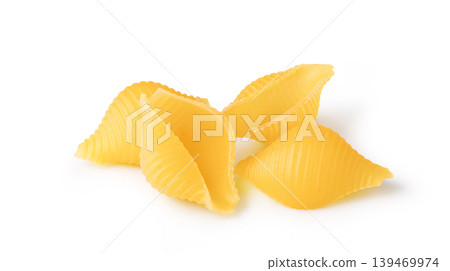 Conchiglie pasta shells creating italian food background Conchiglie pasta shells creating italian food background 139469974