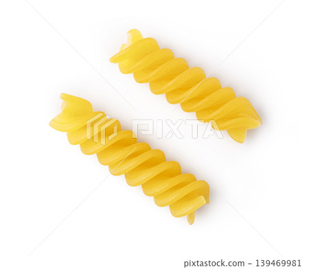 Two pieces of dry fusilli pasta 139469981