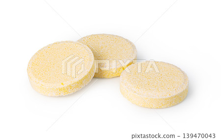 Yellow effervescent tablets representing health and immunity support 139470043