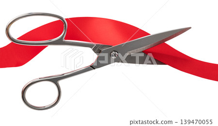 Scissors cutting red ribbon symbolizing grand opening Scissors cutting red ribbon symbolizing grand opening 139470055