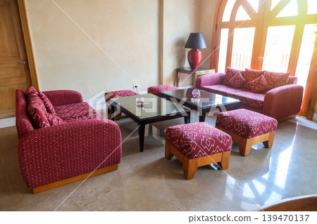Comfortable chairs, sofas and tables in the hotel lobby Comfortable chairs, sofas and tables in the hotel lobby 139470137