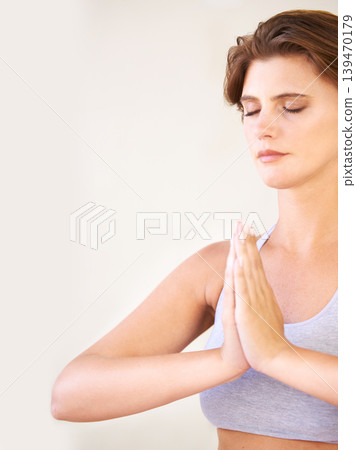 Hands together, wellness and woman with meditation, yoga and exercise with health, home and workout goal. Lounge, person and girl with self care, breathing and zen with peace, RELAX and fitness Hands together, wellness and woman with meditation, yoga and exercise with health, home and workout goal. Lounge, person and girl with self care, breathing and zen with peace, RELAX and fitness 139470179