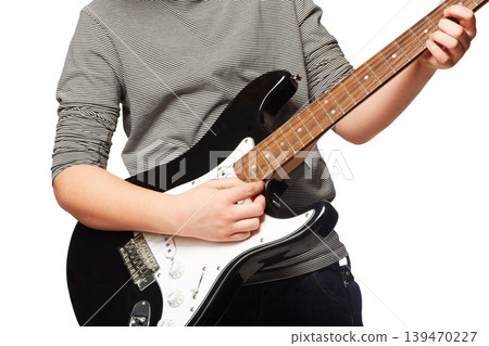 Hands, guitar and studio performance for rock music, playing or concert in closeup by white background. Creative person, artist or musician in clothes, instrument and art with song, band or fashion Hands, guitar and studio performance for rock music, playing or concert in closeup by white background. Creative person, artist or musician in clothes, instrument and art with song, band or fashion 139470227