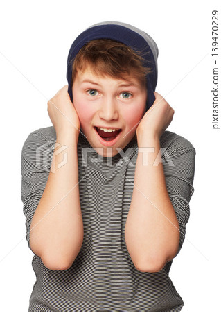 Shock, excited and portrait of child with beanie in a studio for positive, good and confident attitude. Happy, surprise and young boy teenager or kid with wow, omg or wtf face by white background. Shock, excited and portrait of child with beanie in a studio for positive, good and confident attitude. Happy, surprise and young boy teenager or kid with wow, omg or wtf face by white background. 139470229
