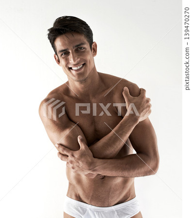 Man, underwear and wall background for body, portrait or natural bodybuilder for arms, fitness and health. Guy, person and healthy for smile, pride or fashion for strong muscle, abdomen or wellness Man, underwear and wall background for body, portrait or natural bodybuilder for arms, fitness and health. Guy, person and healthy for smile, pride or fashion for strong muscle, abdomen or wellness 139470270