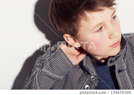 Teenager, fashion and boy thinking in studio, white background or dream of future. Cool, style and child with ideas, creativity and confidence in trendy clothes, outfit and personality on backdrop Teenager, fashion and boy thinking in studio, white background or dream of future. Cool, style and child with ideas, creativity and confidence in trendy clothes, outfit and personality on backdrop 139470309