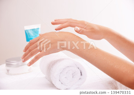 Skincare, lotion and hands closeup in spa, touch and massage for wellness. Fingers, nails and woman apply cream in treatment, natural cosmetics or dermatology moisturizer, beauty health or manicure Skincare, lotion and hands closeup in spa, touch and massage for wellness. Fingers, nails and woman apply cream in treatment, natural cosmetics or dermatology moisturizer, beauty health or manicure 139470331