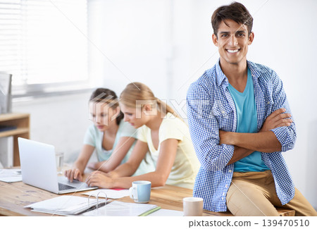 Business portrait of happy man at desk with team, laptop and paperwork at coworking accounting office. Happy startup, manager and women on website for admin documents at online tax consulting agency. Business portrait of happy man at desk with team, laptop and paperwork at coworking accounting office. Happy startup, manager and women on website for admin documents at online tax consulting agency. 139470510