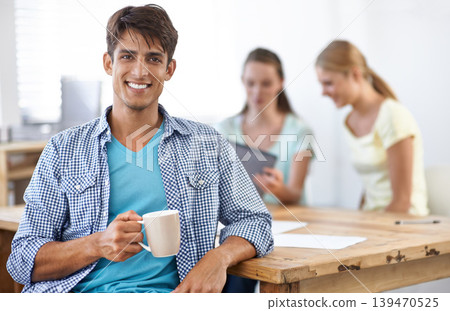 Businessman, drinking coffee and smile in portrait, employee and confidence for career and planning. Indian male person, teamwork and pride for collaboration or support in office, happy and hot tea 139470525