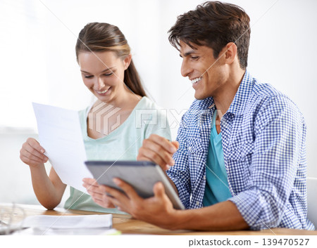 Office, happy woman and man with tablet, documents and proposal for online research. Startup, partnership and business people at desk at digital design with collaboration, coworking and paperwork. Office, happy woman and man with tablet, documents and proposal for online research. Startup, partnership and business people at desk at digital design with collaboration, coworking and paperwork. 139470527