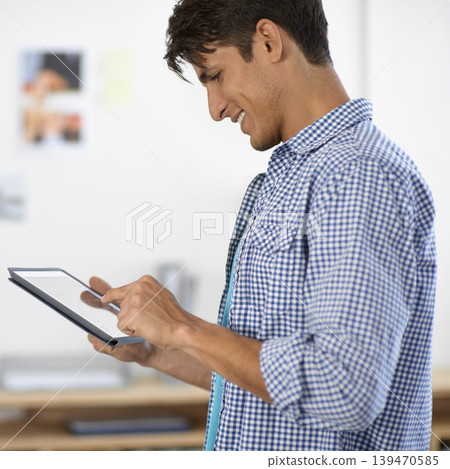 Creative, business man and scroll on tablet in office for planning research, information and social network in startup agency. Happy designer review digital news, software and app with technology Creative, business man and scroll on tablet in office for planning research, information and social network in startup agency. Happy designer review digital news, software and app with technology 139470585