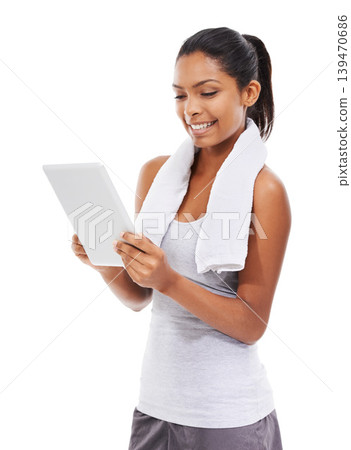 Fitness, smile and woman with a tablet, typing and exercise isolated on a white studio background. Person, blog and model with digital app, connection or influencer with information, wellness or tech 139470686