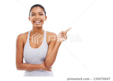 Pointing up, exercise and woman with promotion, portrait and wellness isolated on a white studio background. Person, hand gesture or model with decision, options and choice with sports or opportunity 139470687