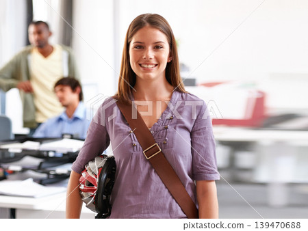 Portrait, business woman and bike helmet in office for commute to startup creative agency and employee. Entrepreneur, consultant with safety or tablet and blurred background at workplace with smile 139470688