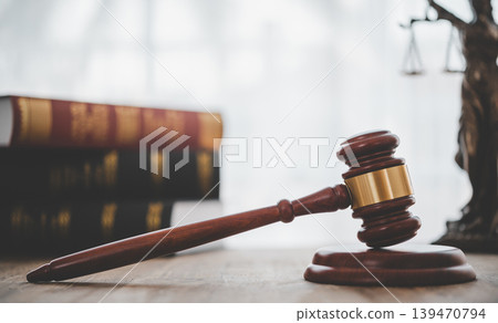 Law theme, mallet of the judge, law enforcement officers, evidence-based cases, and documents taken into account. Law theme, mallet of the judge, law enforcement officers, evidence-based cases, and documents taken into account. 139470794